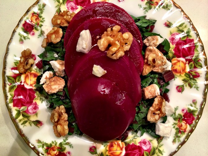 Ingredients:  -Boiled beetroots -Raw or steamed chopped beet leaves and stems -Sprinkle of goat cheese and walnuts  -Drizzle of balsamic vinegar and olive oil 